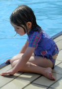 child by the water